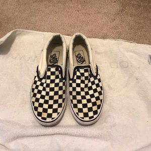 Checkered black and white vans